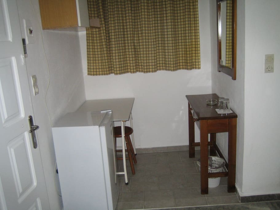 Refrigerator and working table