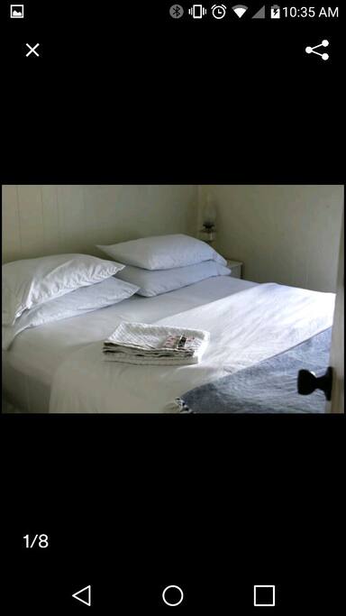 One of the two first floor bedrooms. Comfy queen bed.