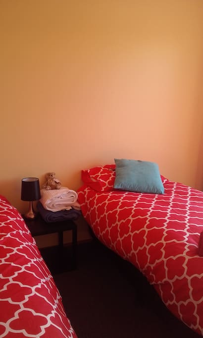 2 cosy single beds, can easily be moved together to make a queen size bed