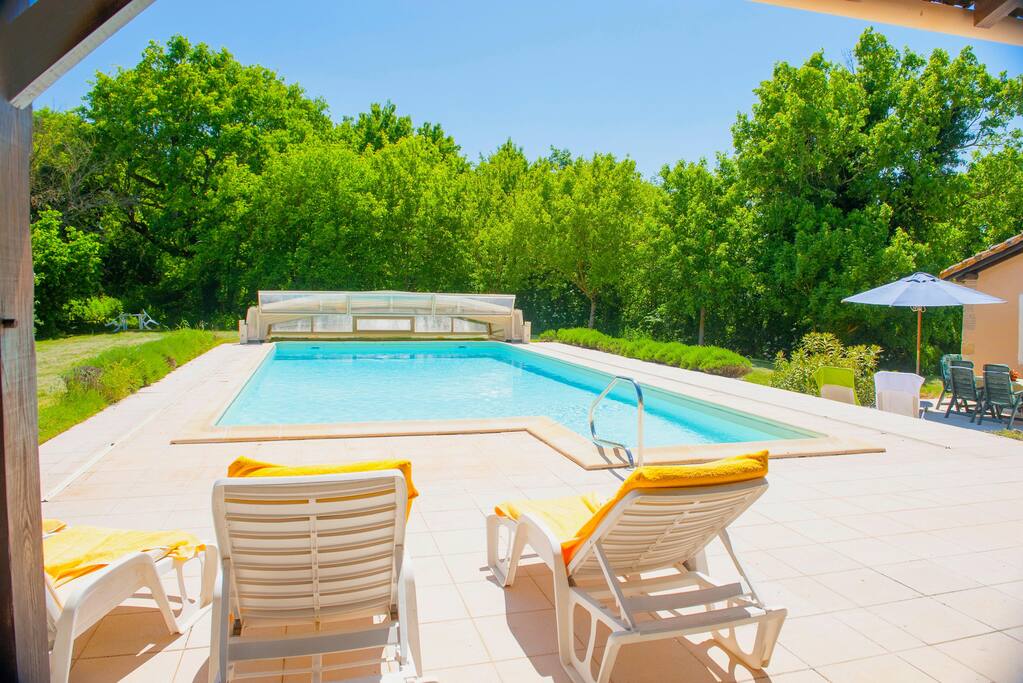 Large pool and patio area.