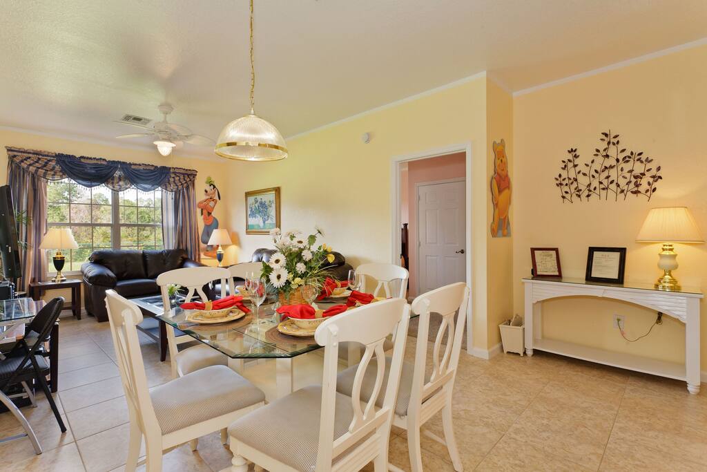 Tastefully decorated living & dining area looking into lovely conservation area