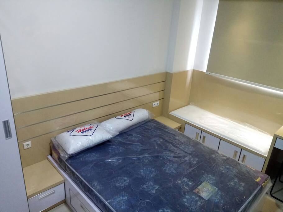 Bedroom equipped with ample of storage and air conditioner