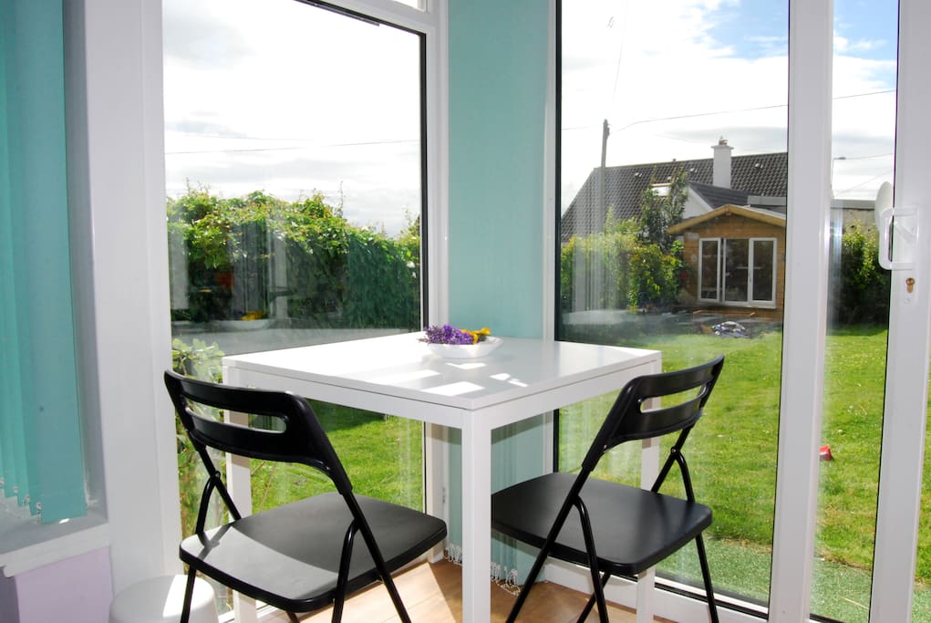For a quick bite, a cup of tea or study, the table overlooking the garden will do you well.