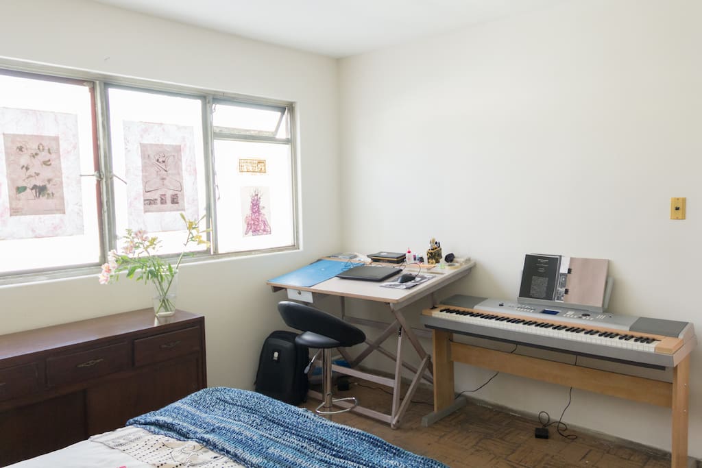 Yamaha Keyboard and white draft table