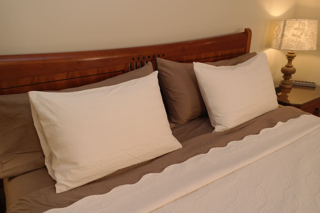 Four pillows are provided on the King Bed.
