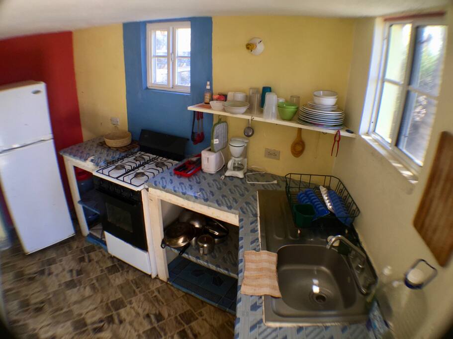 Private small kitchen - accessible across the deck from bedroom.