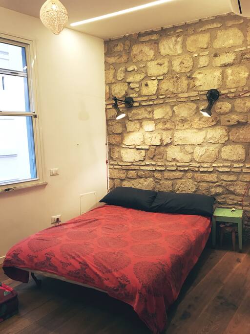 Your room, facing a very quiet closed road.