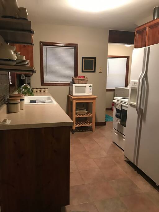 The fully equipped kitchen will meet all your needs during your stay. Enjoy teas and gourmet coffee with your complimentary morning pastries.
There is also a full size washer/dryer set for you to use during your visit.