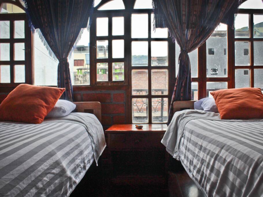 Our twin room with big windows