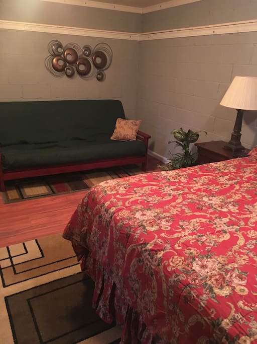 Queen bed with full futon. New laminate floor.