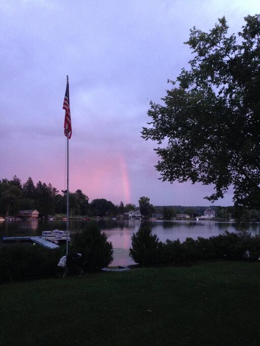 Rainbow at sunset over the lake