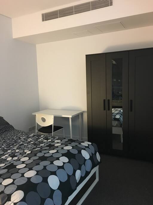 Bedroom with wardrobe and study desk