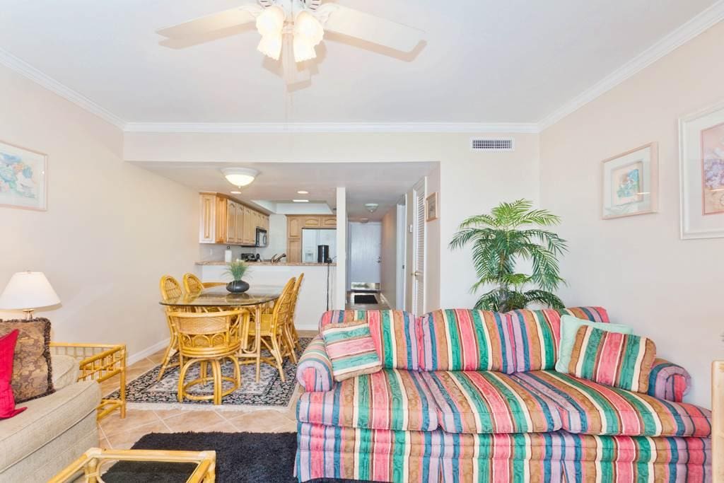 2nd floor living room with tile floors & ocean views - Our bright, sunny and beautifully furnished 2nd floor living room features