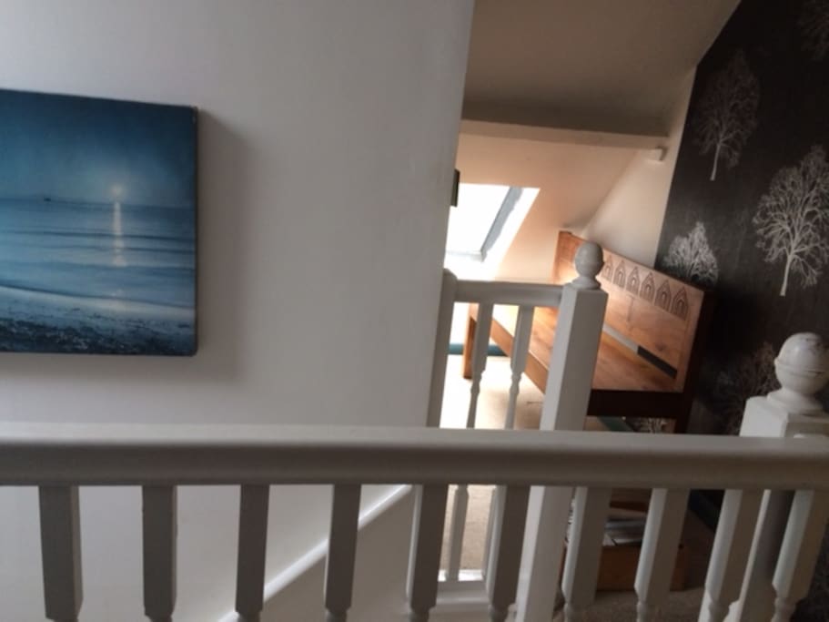 Galleried bedroom at the top of the house