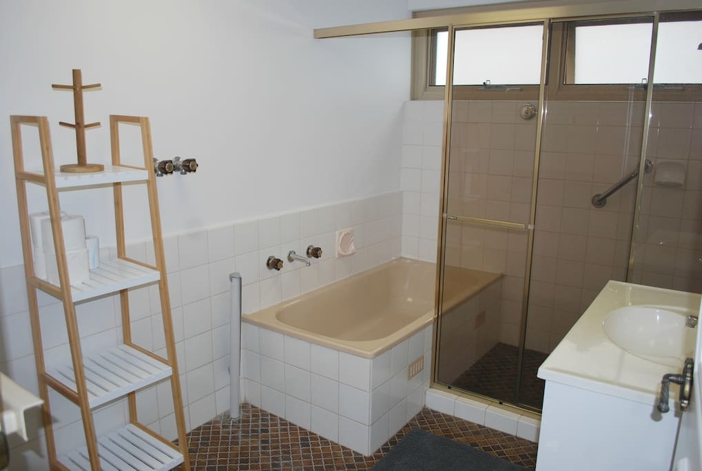 Bathroom with full size bath and shower