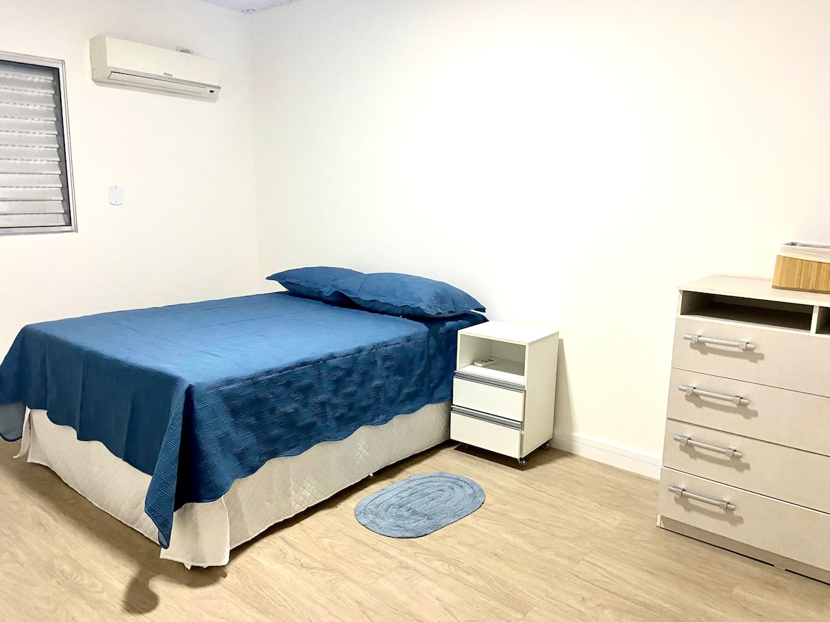 Bedroom 1, with a double bed and dresser to organize your belongings 