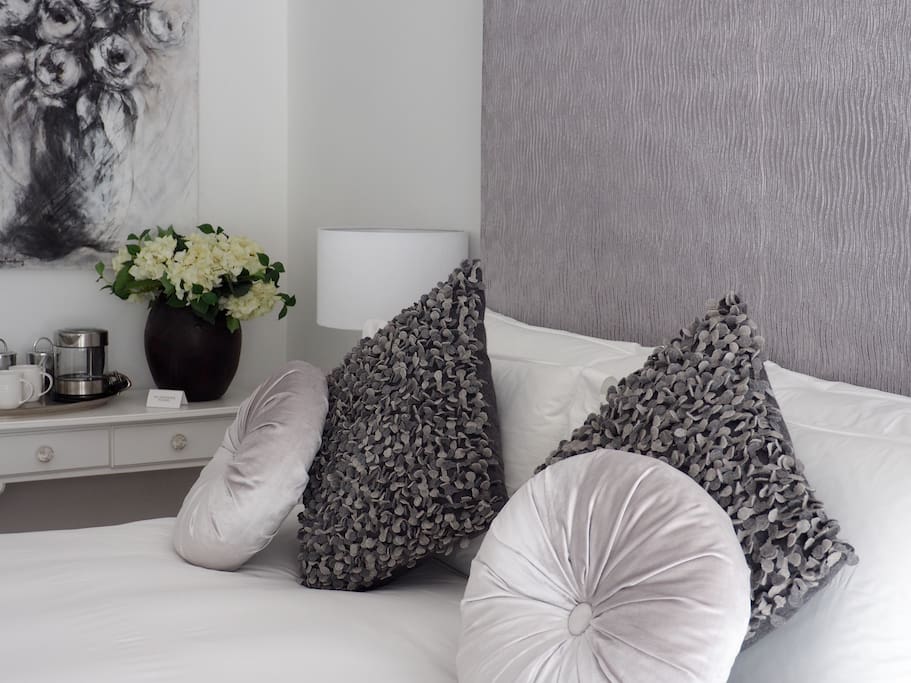 Crisp white pure cotton linen and soft down duvets and pillows for you to enjoy