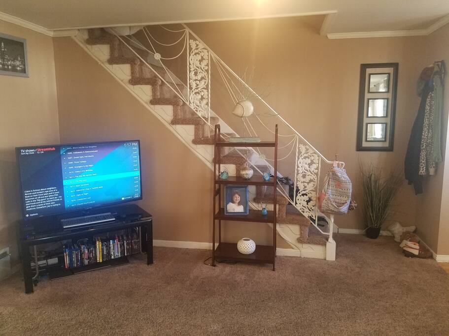 Living area (2) stairwell to upstairs 3 bedrooms and bathroom