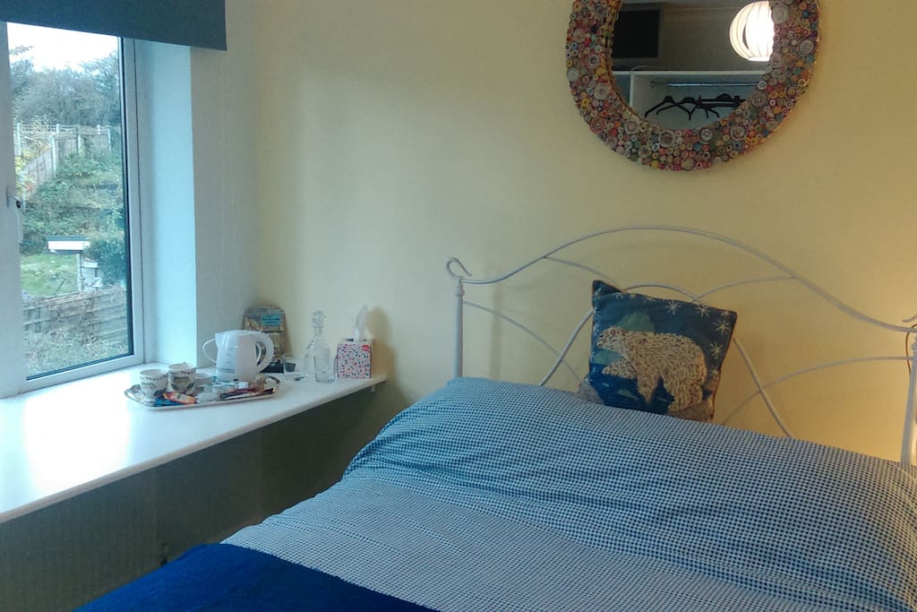 Comfy double bed in south facing room overlooking gardens