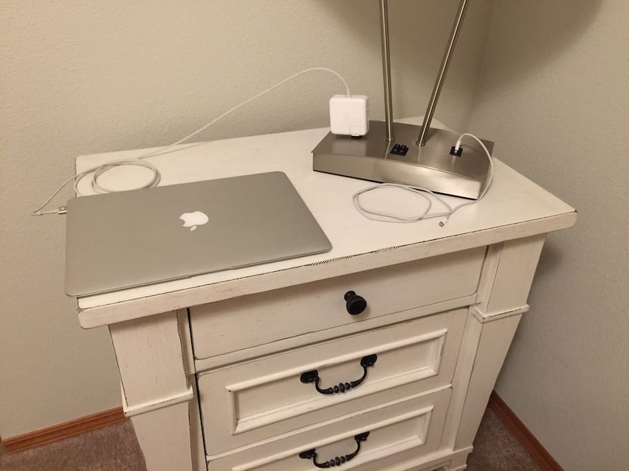 A usb port and outlet to charge items.