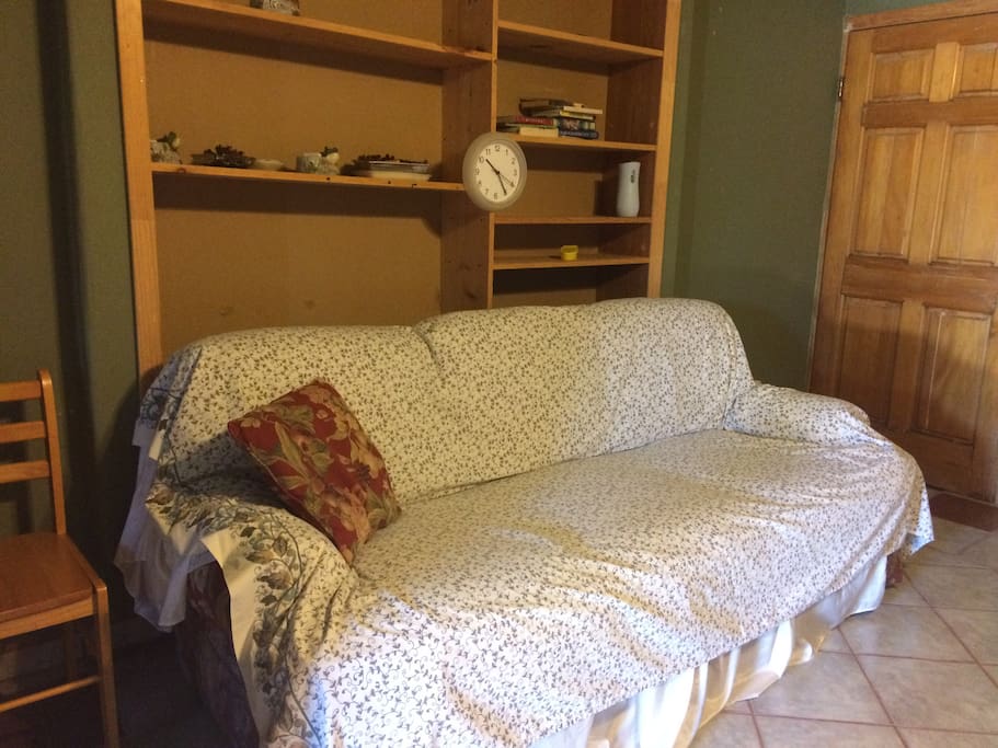 A comfortable lounging or extra sleeping place.