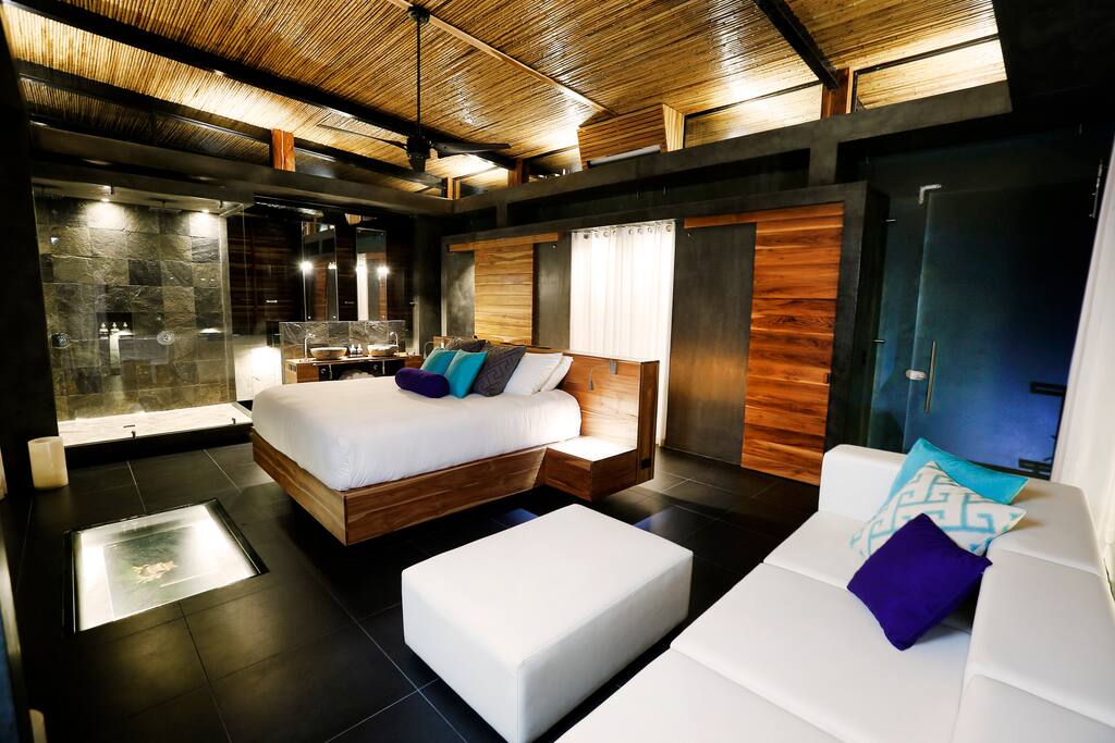 Infinity Suite at night with bathroom view