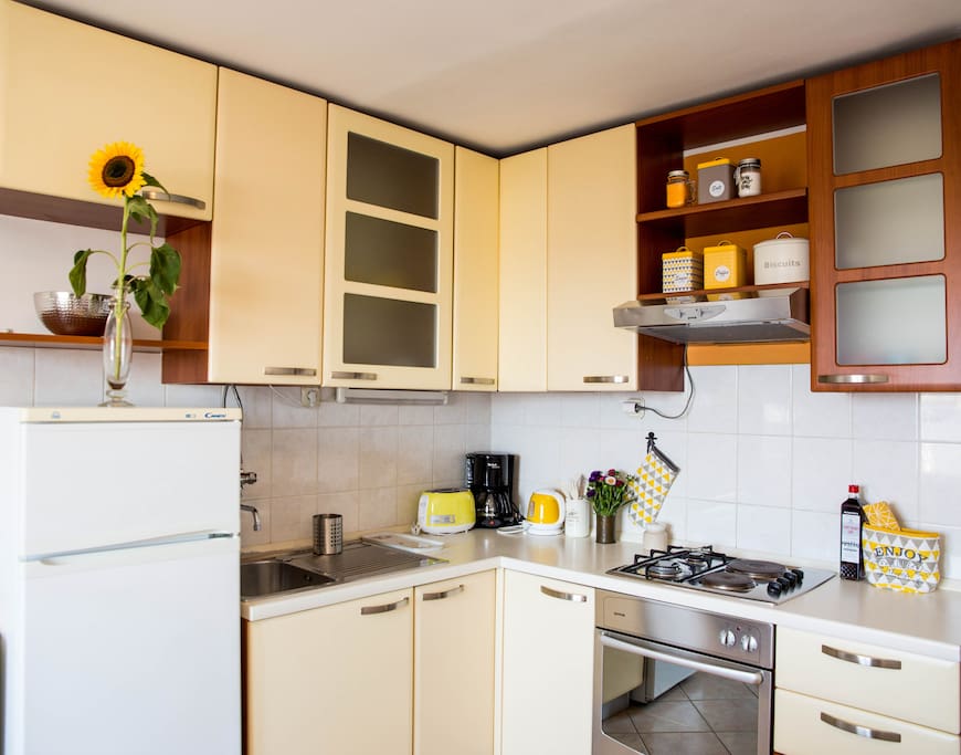 fully equipped kitchen for cooking