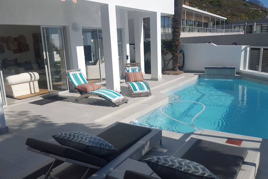 Sunny Pool and deck area with gas barbeque and 8 seater outdoor table and chairs!