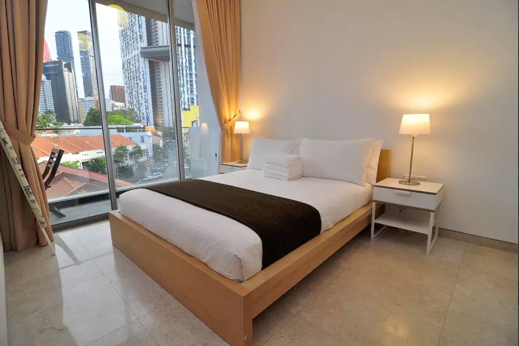 Master bedroom with queen bed and ensuite bathroom.