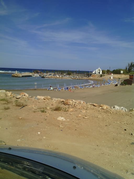 Agia Triada beach. Distance about 1.6km from PROTARAS BLUE SEA APARTMENT (about 25 minutes walking time)