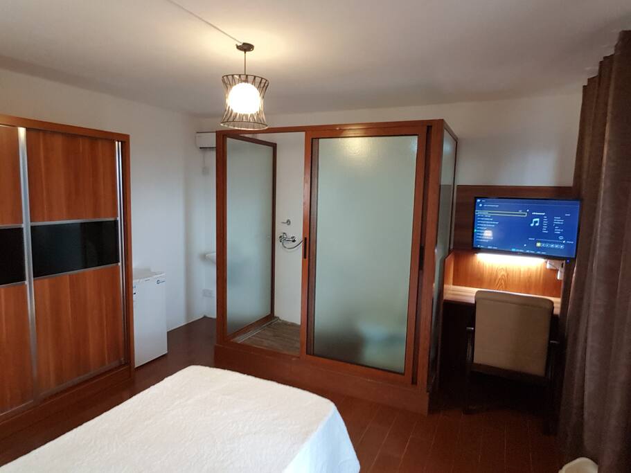 THREE PRIVATE BEDROOMS WITH WORK STATIONS AND LOCAL TV