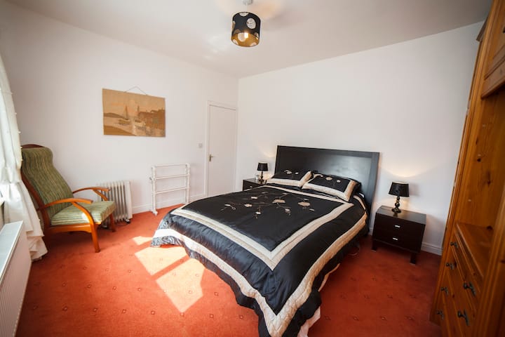 Main Bedroom with King Size bed is bright and spacious