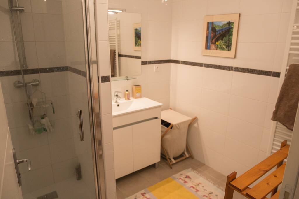 Spacious bathroom, with toilet separate.