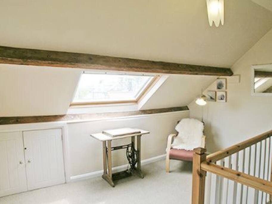 Top bedroom with seating area