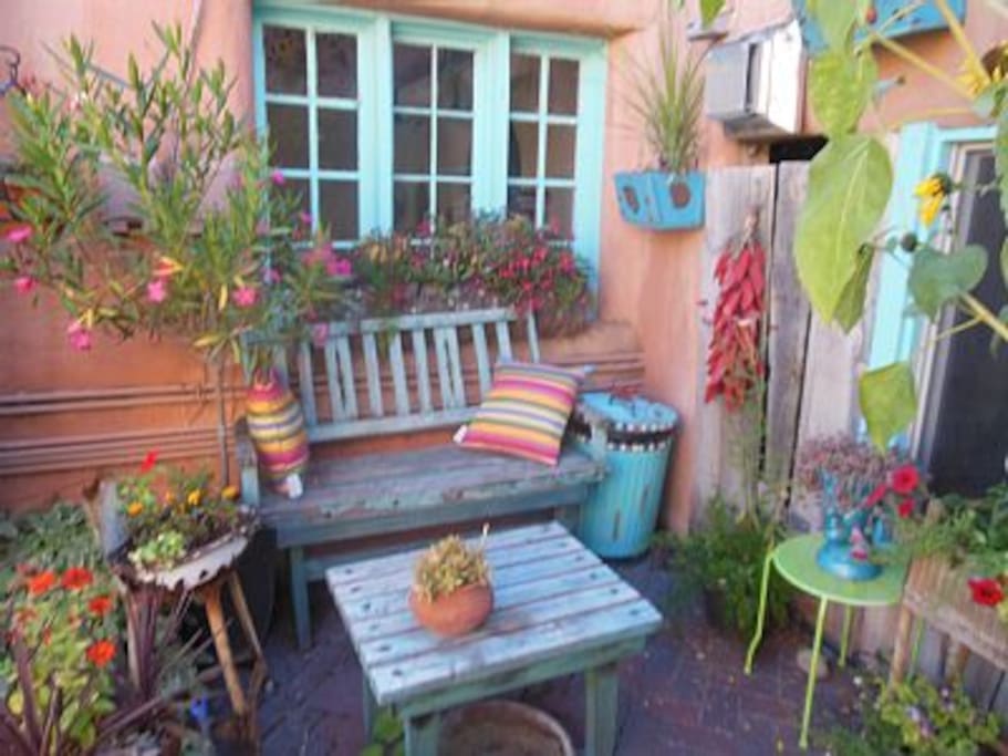 Bench and flowers in front courtyard