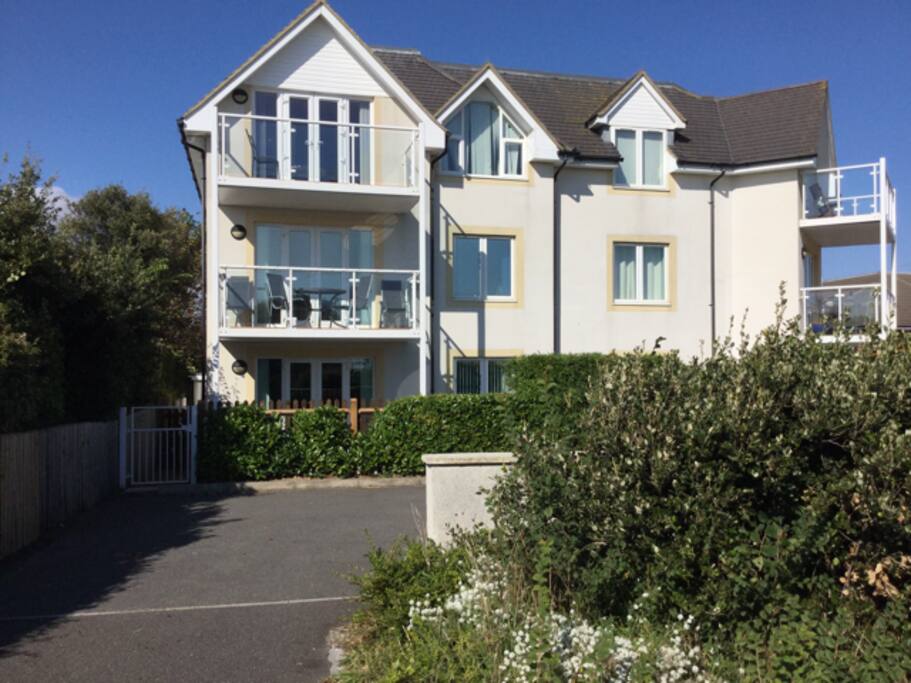 Access gate to car space, garden and apartment.