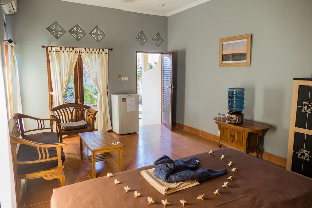 Spacious and bright bedroom with sitting area