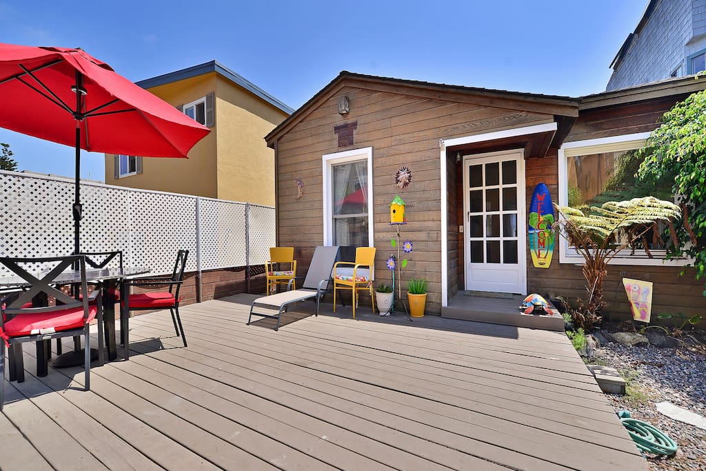 Large deck and front entrance to the home