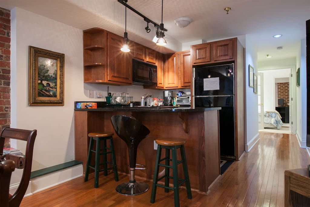 Great kitchen area with electric stoves