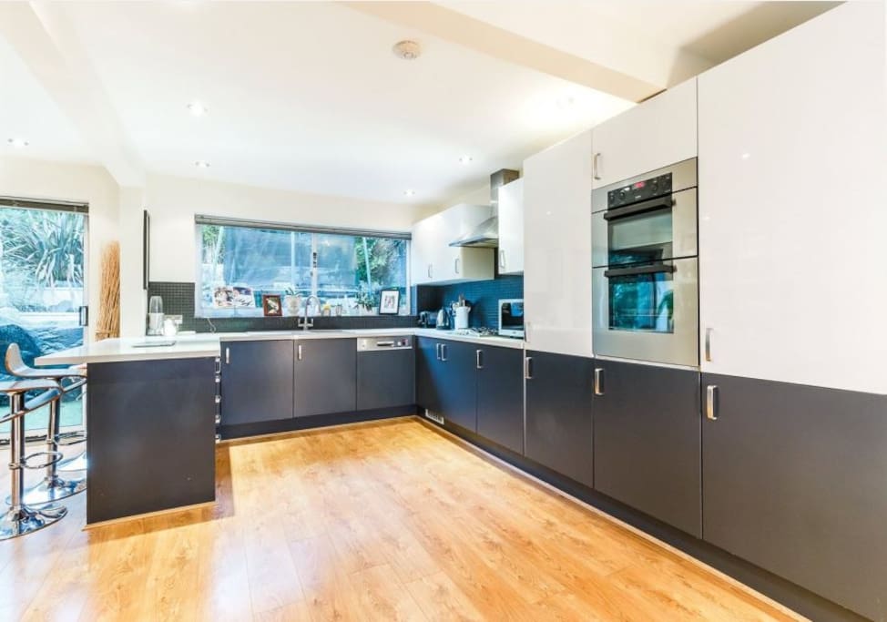 Open-plan modern kitchen fitted to a high standard