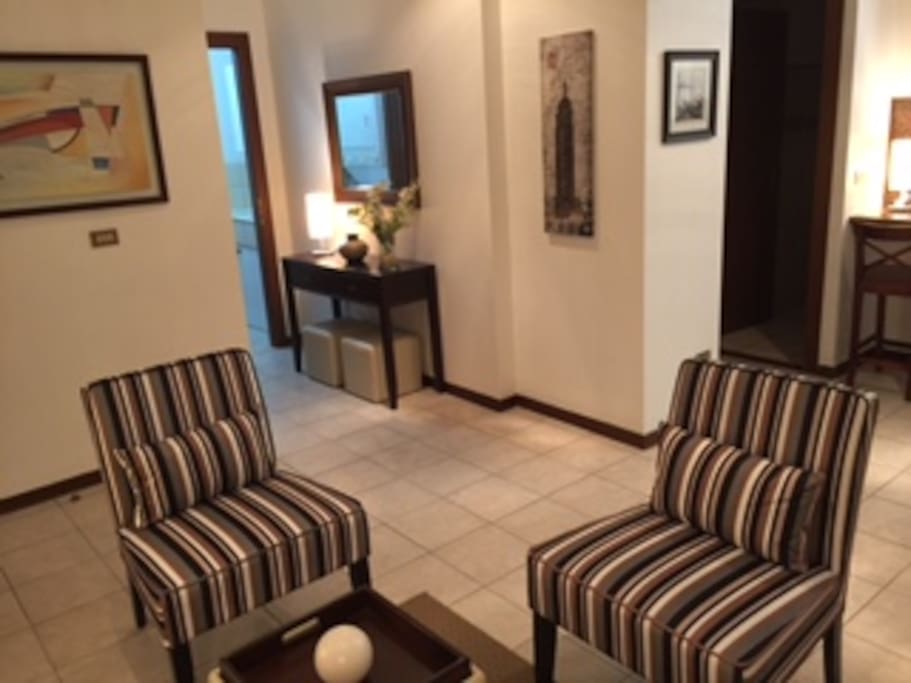 Entrance and Seating Chairs (In Back: Laundry Room)