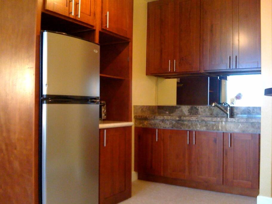 Refrigerator, portable cooktop, microwave, toaster oven and cooking utensits