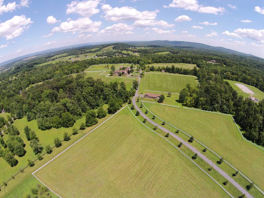 Welcome to our estate, this is a bird's eye-view coming in the private gated entrance, and the furthest structure in the distance is the house!