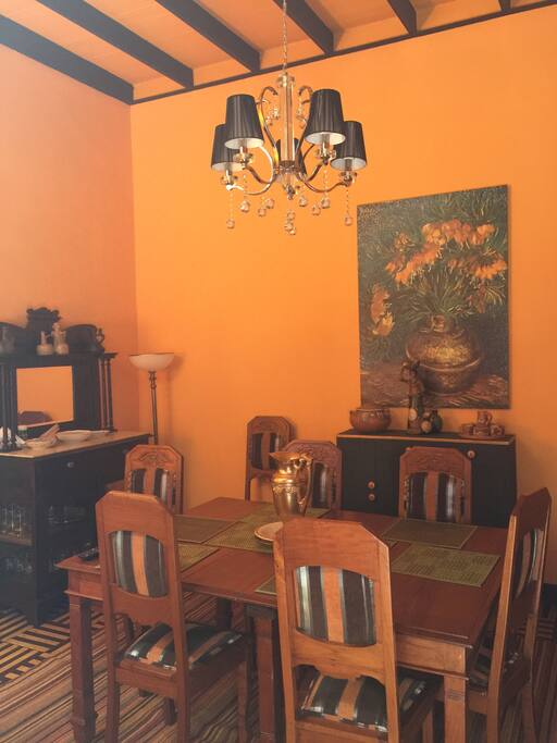 DINING ROOM with high beam ceiling