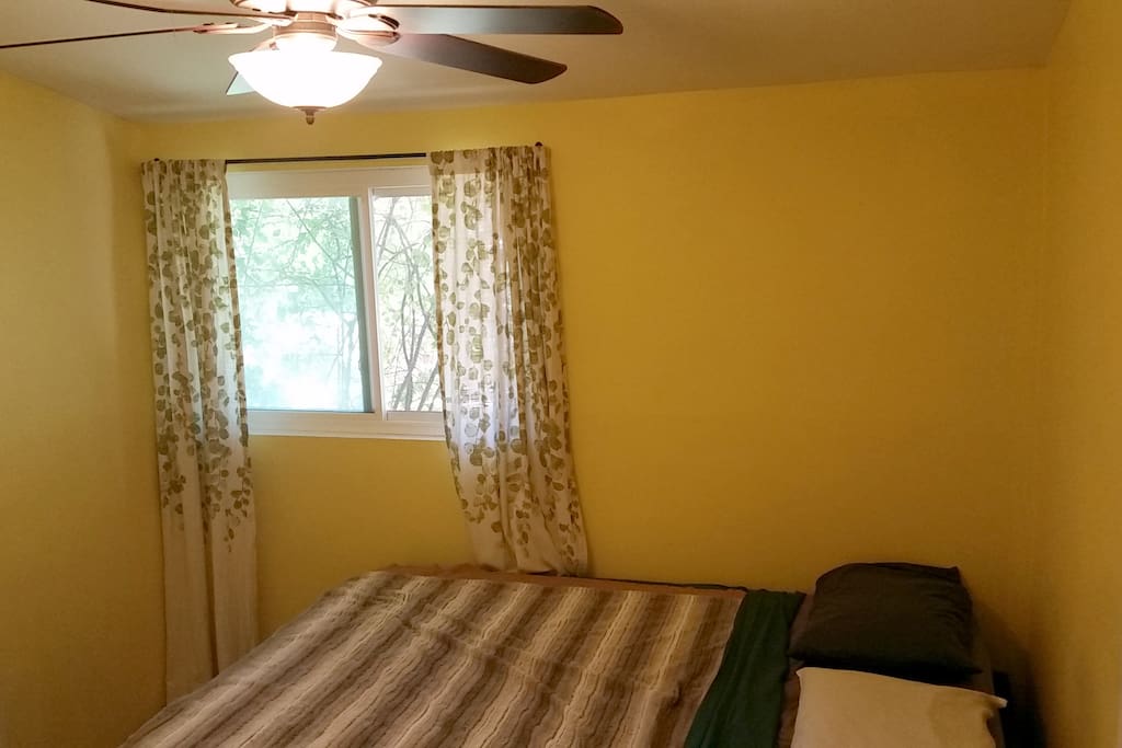 This is a standard/small bedroom in a humble, small home built in 1955 with no add ons.