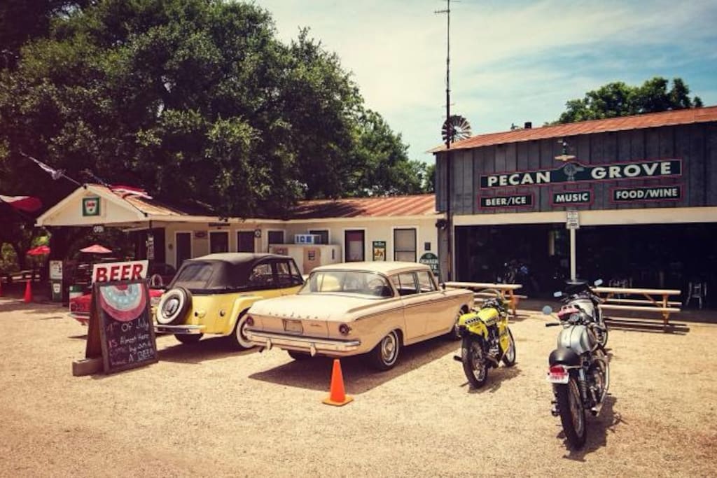 Pecan Grove Store next door. They have burgers/live music/beer/etc