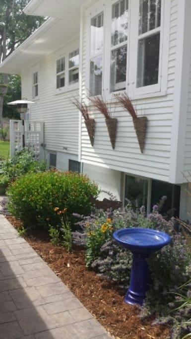 Side yard with bird bath.