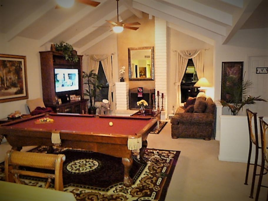 Game and Sports room with bar
