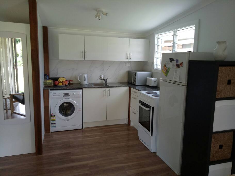 Full Kitchen & washing machine.