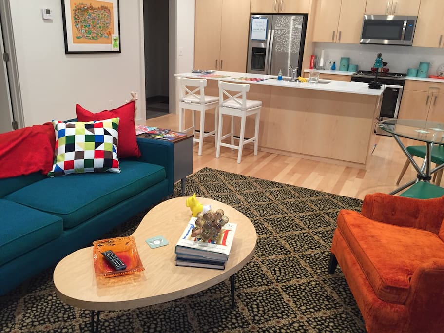 Bold colors and large windows make the space light and bright.